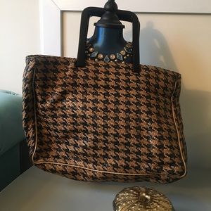 Black and brown tote bag with long handles